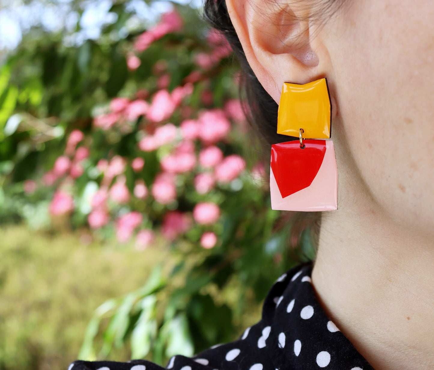Geometric dangly studs in yellow and red / upcycled Irish jewellery design
