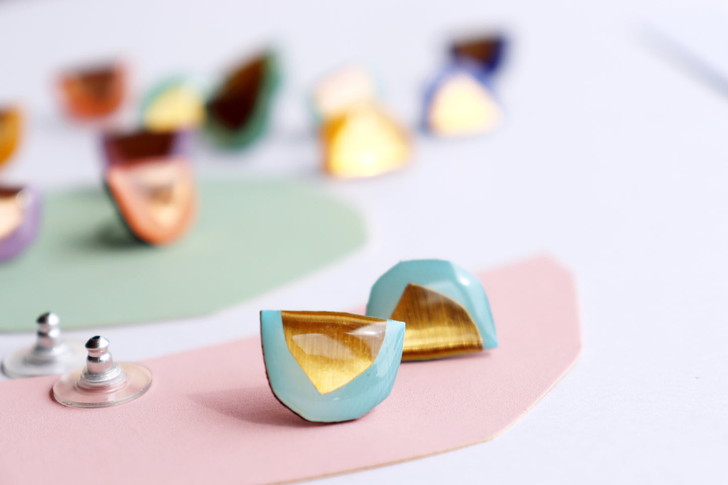 eco chic resin stud earrings in light blue and gold / upcycled vinyl record