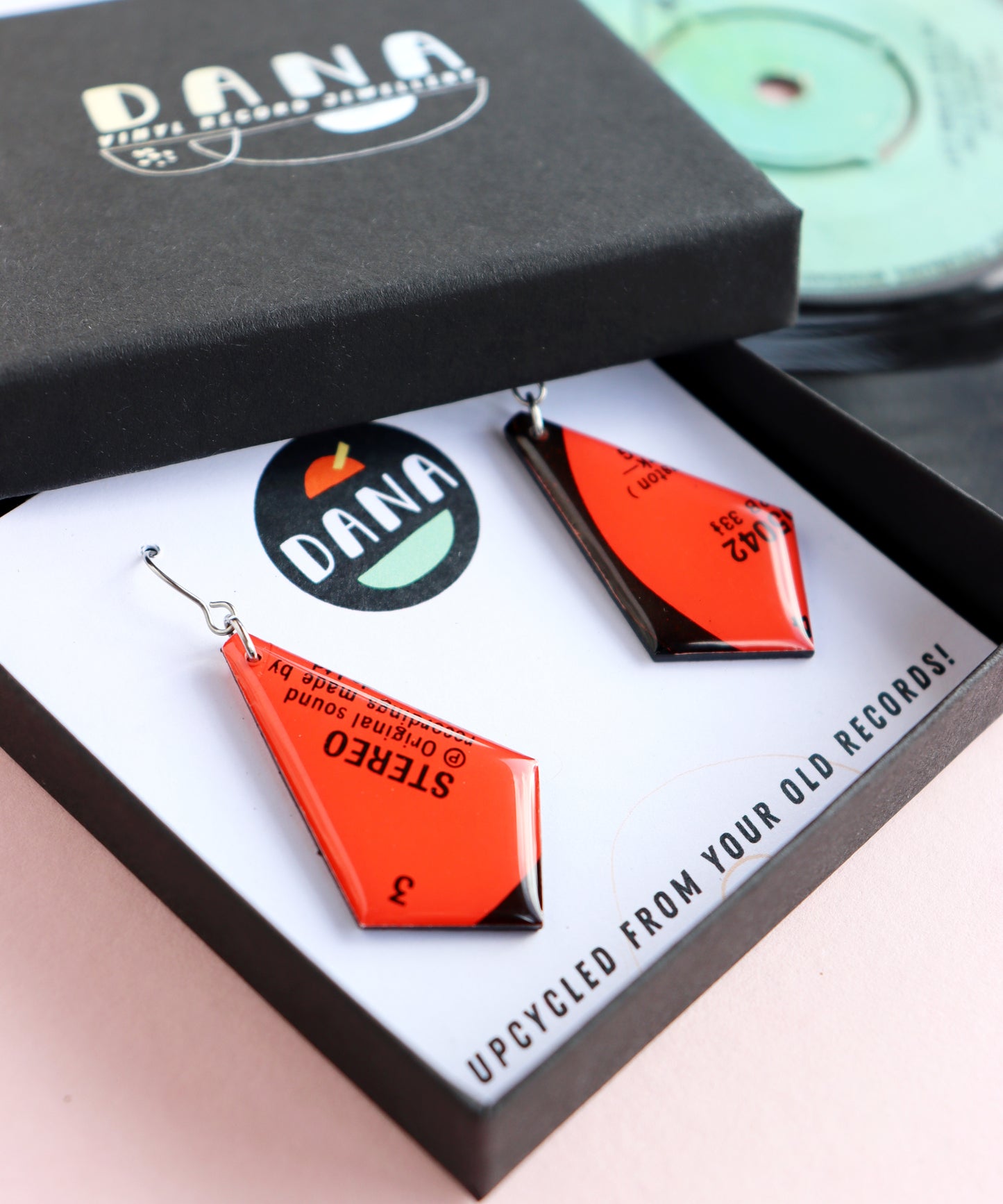 Bright red recycled vinyl record earrings -