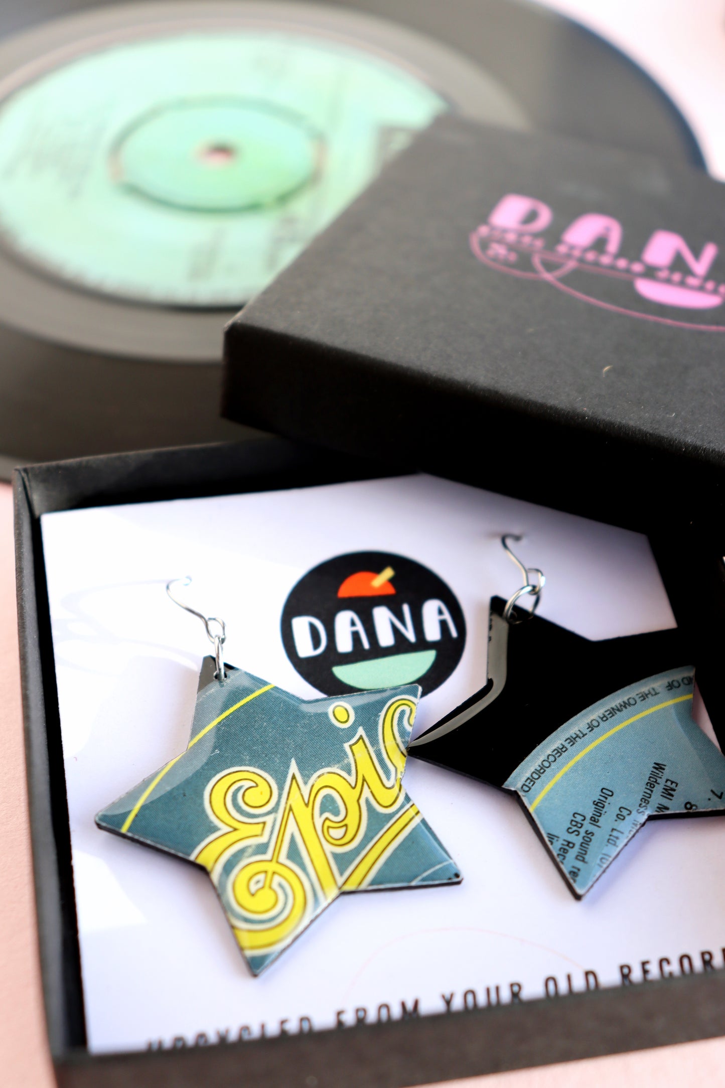 A pair of very EPIC upcycled vinyl record earrings