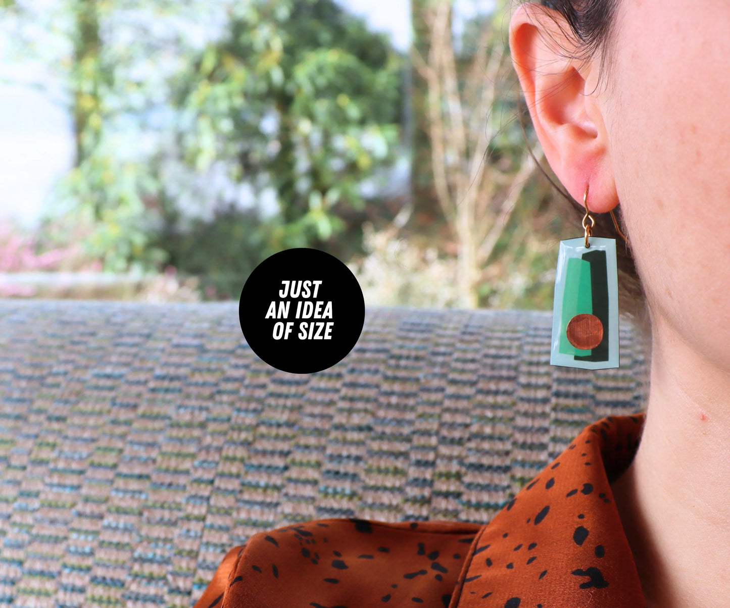 In shades of green with a pop of copper / recycled vinyl earrings