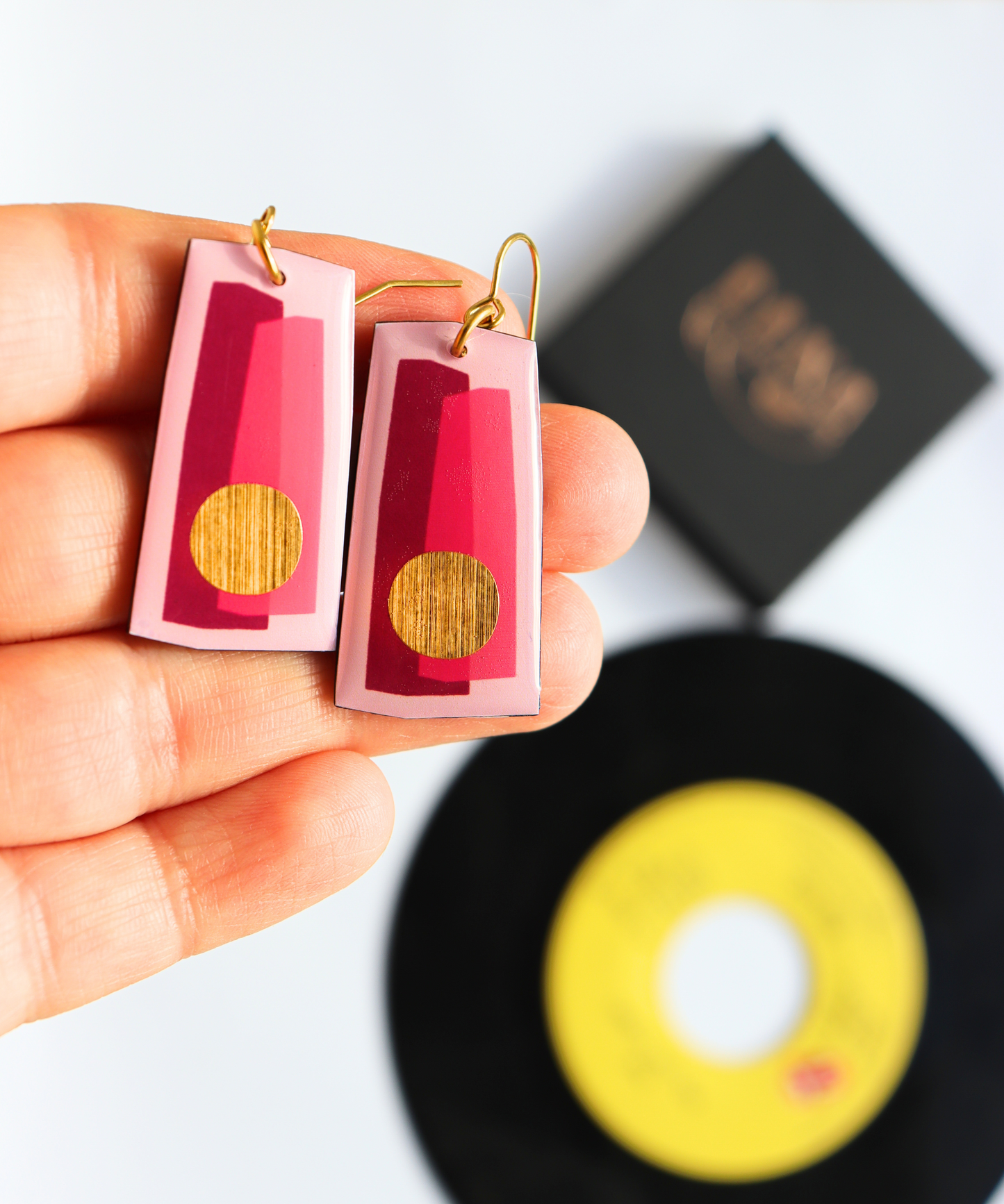 In shades of fuchsia and pink with a pop of gold / recycled vinyl earrings