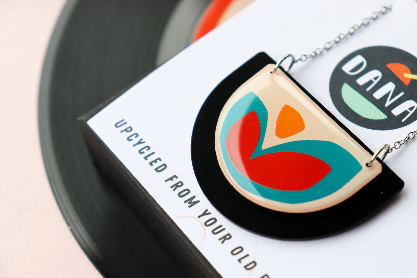 30% OFF / FLOR upcycled vinyl record necklace in red, teal and orange