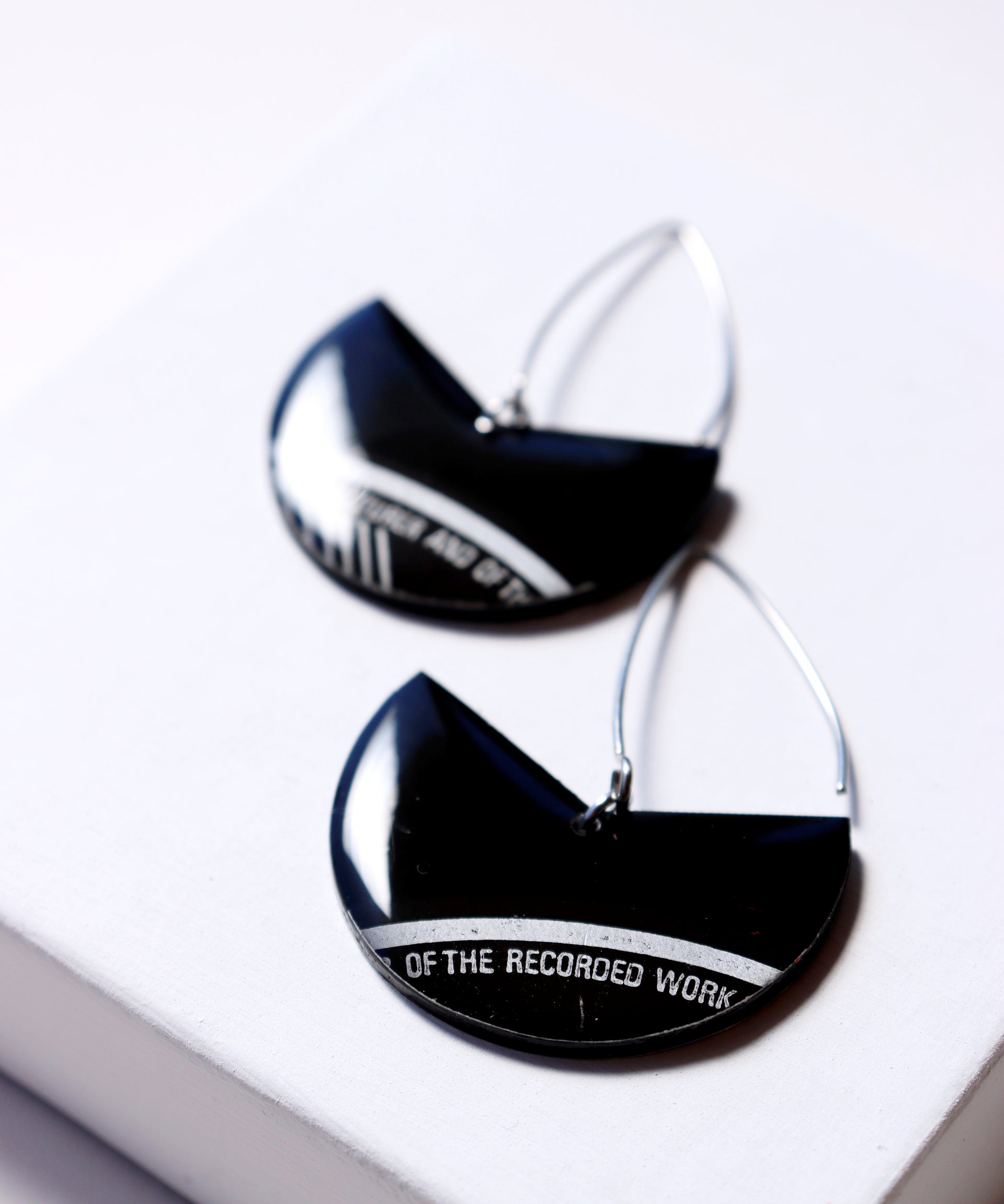 Elegant upcycled black vinyl record earrings with a subtle hint of silvery grey label / ONE OF A KIND