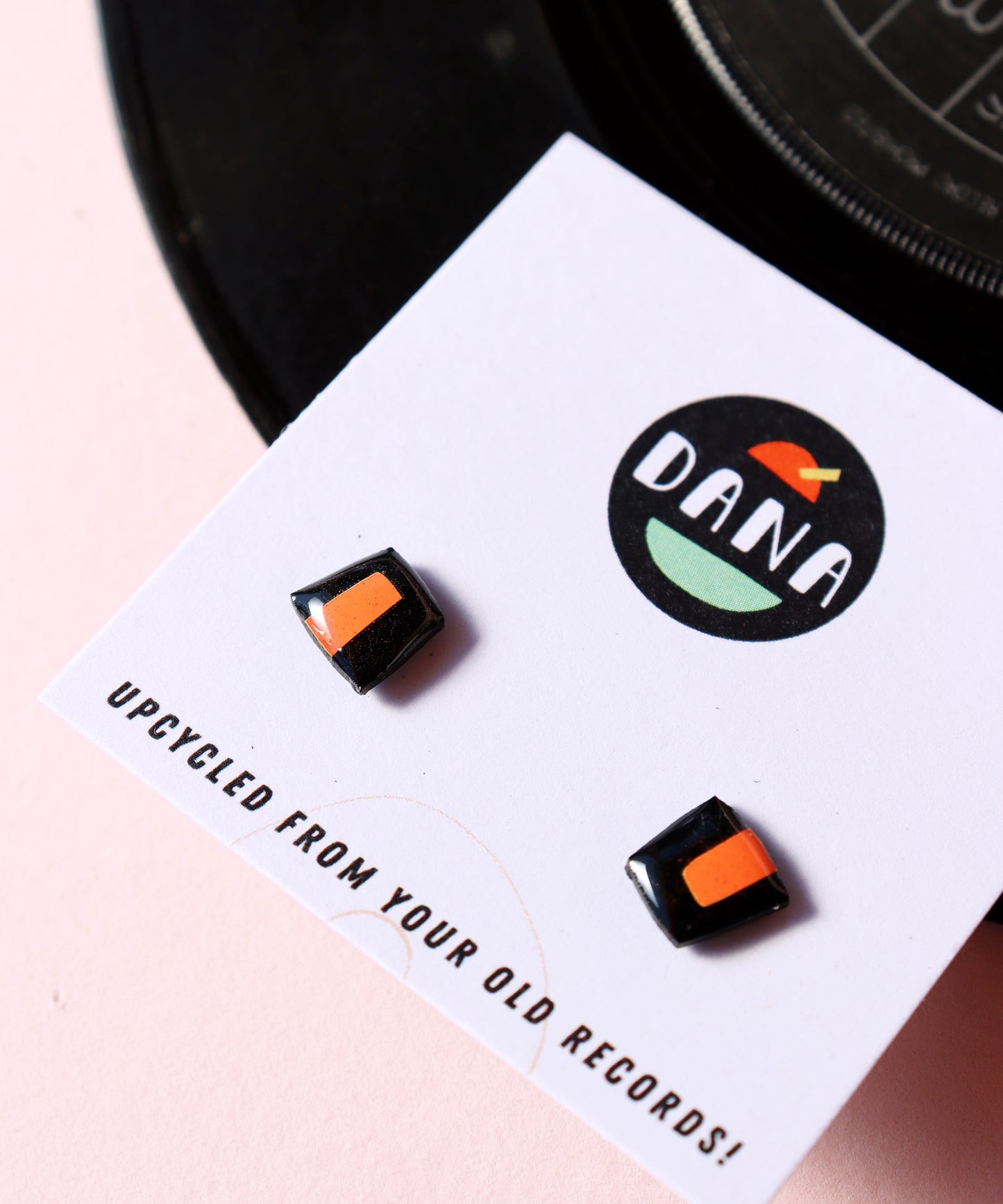50% OFF / small upcycled vinyl record studs in black and orange