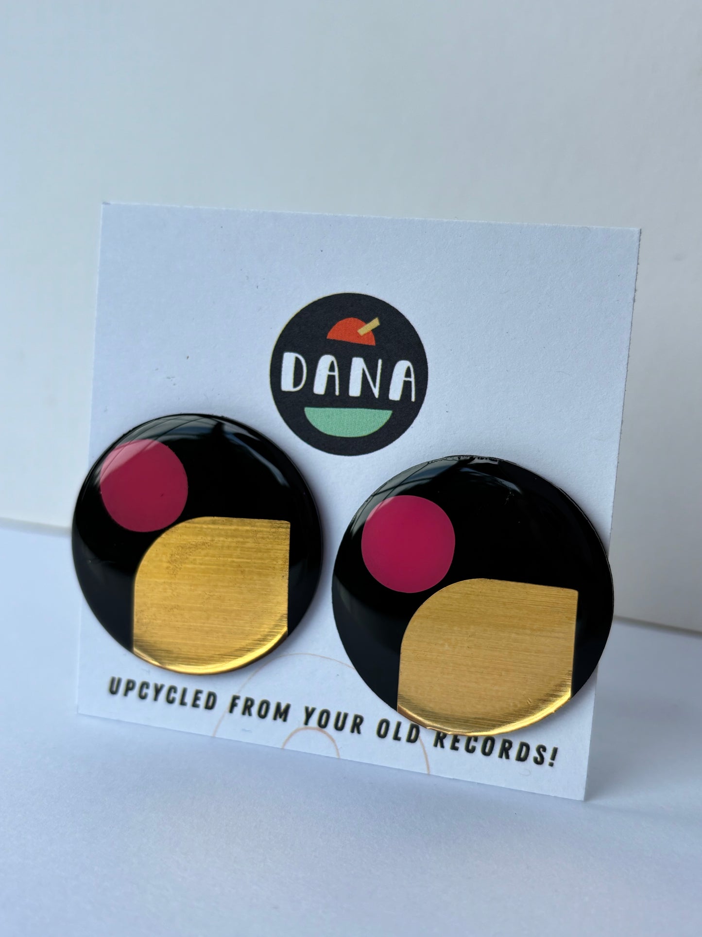40% off large upcycled vinyl record studs in black, gold, and purple