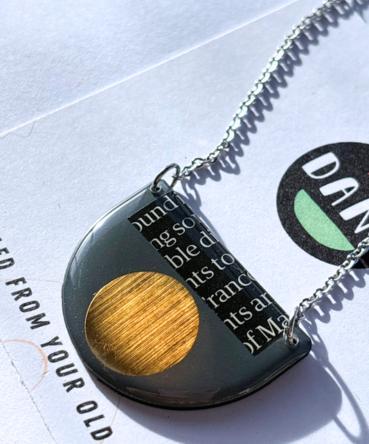 40% OFF graphic necklace in deep blue grey, gold and a hint of magazine paper