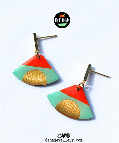 ISLA in mint green, deep orange, gold