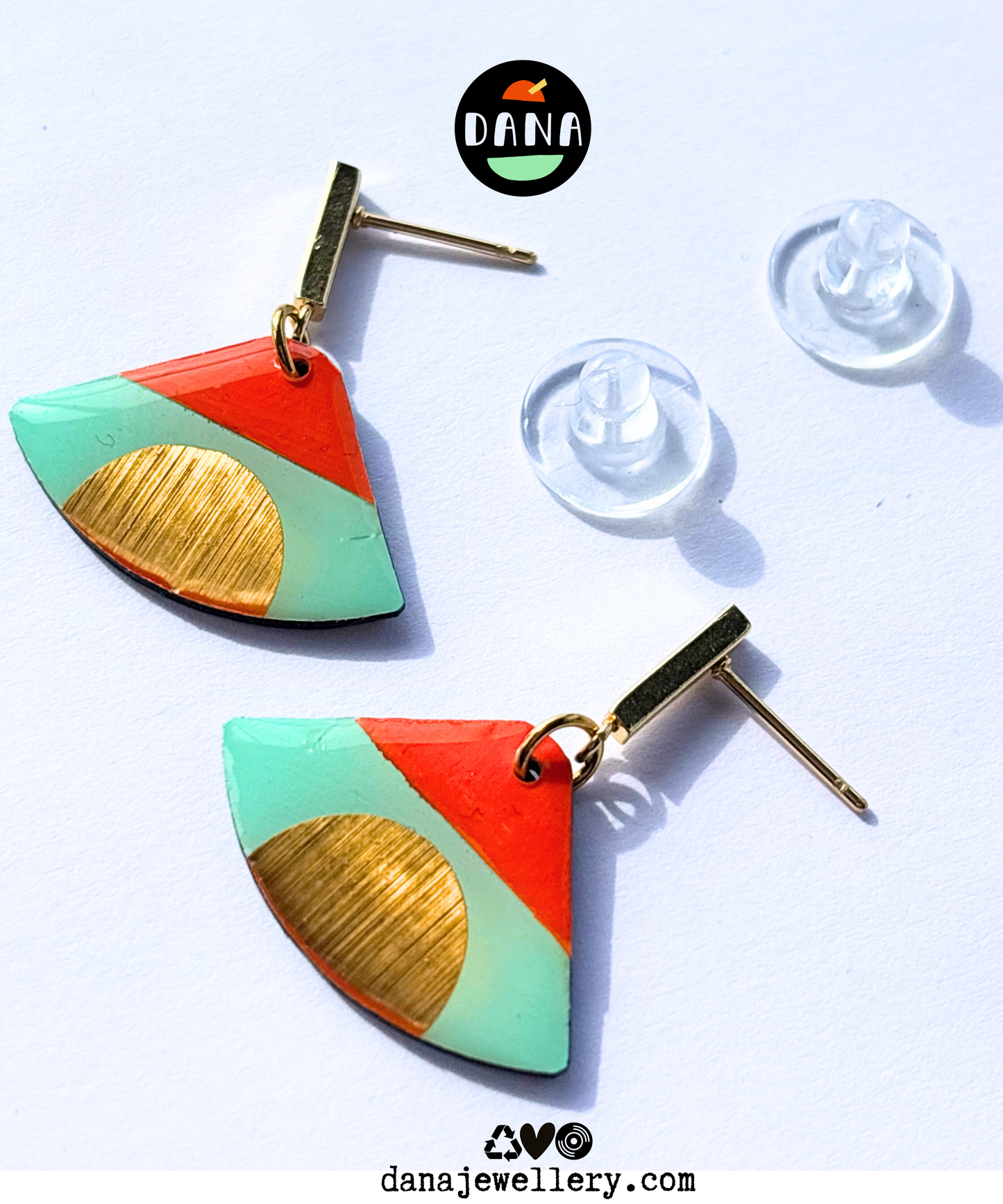 ISLA in mint green, deep orange, gold