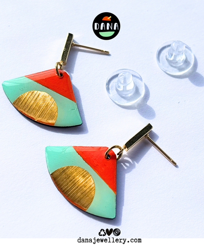 ISLA in mint green, deep orange, gold