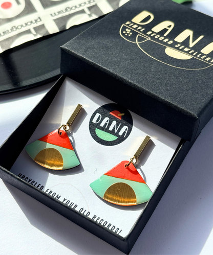 ISLA in mint green, deep orange, gold