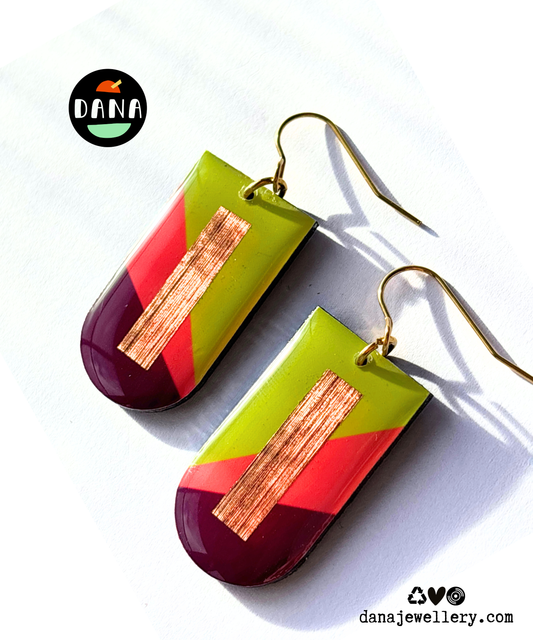 NINA in lime green, deep orange, plum, and copper