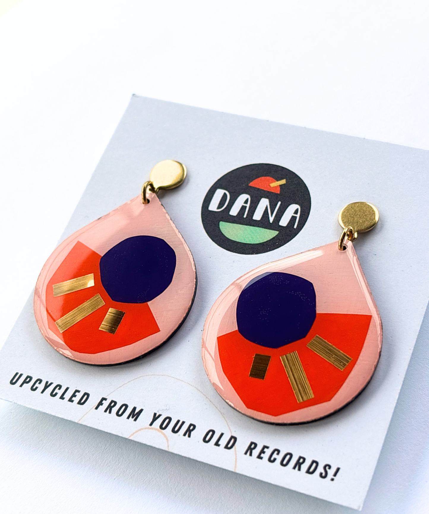 CALI in pink, orange, deep purple, gold