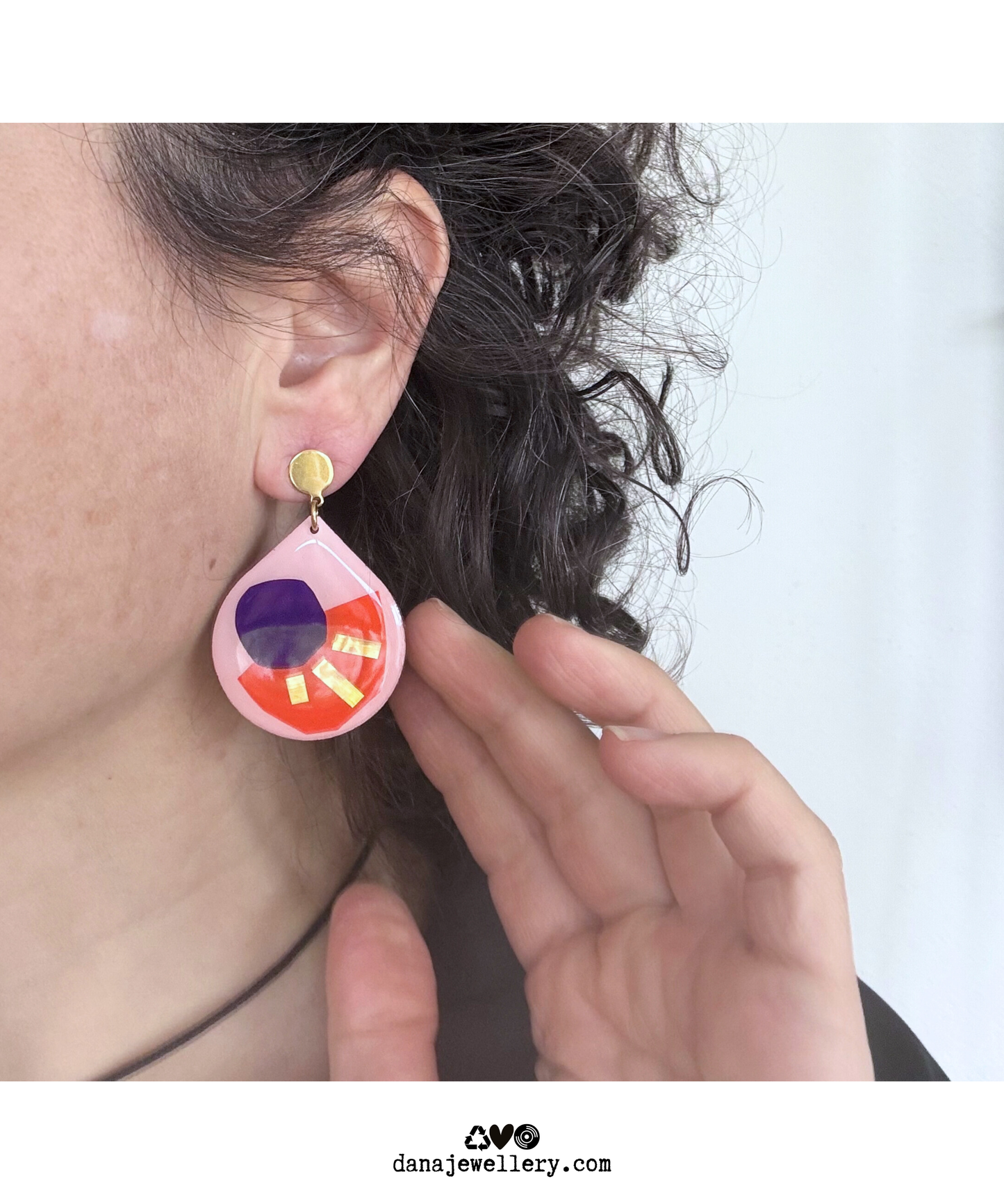 CALI in pink, orange, deep purple, gold