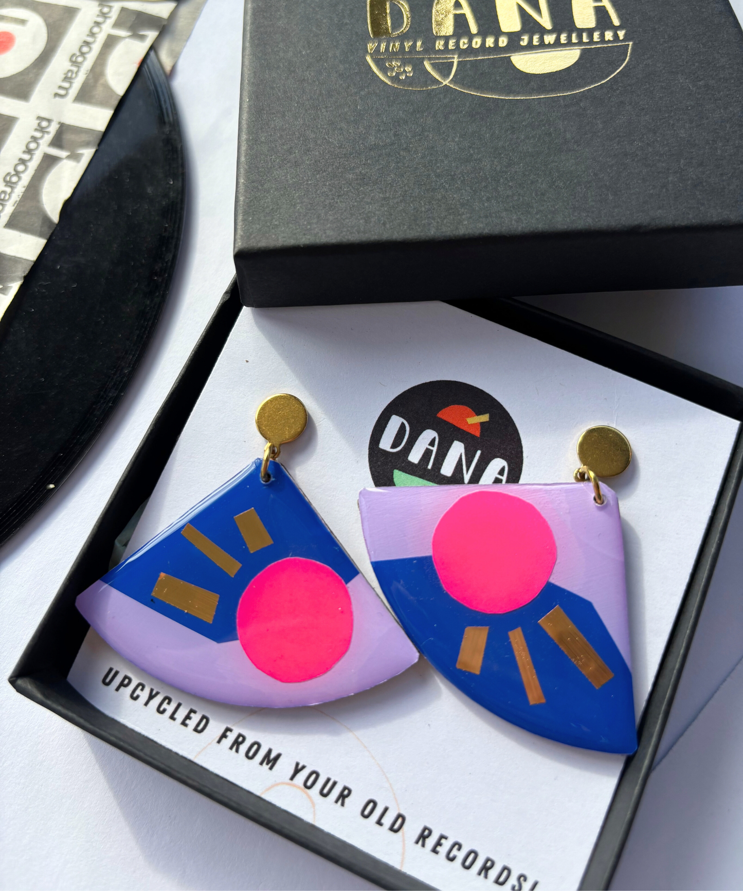 TIA in lilac, navy, neon pink, gold