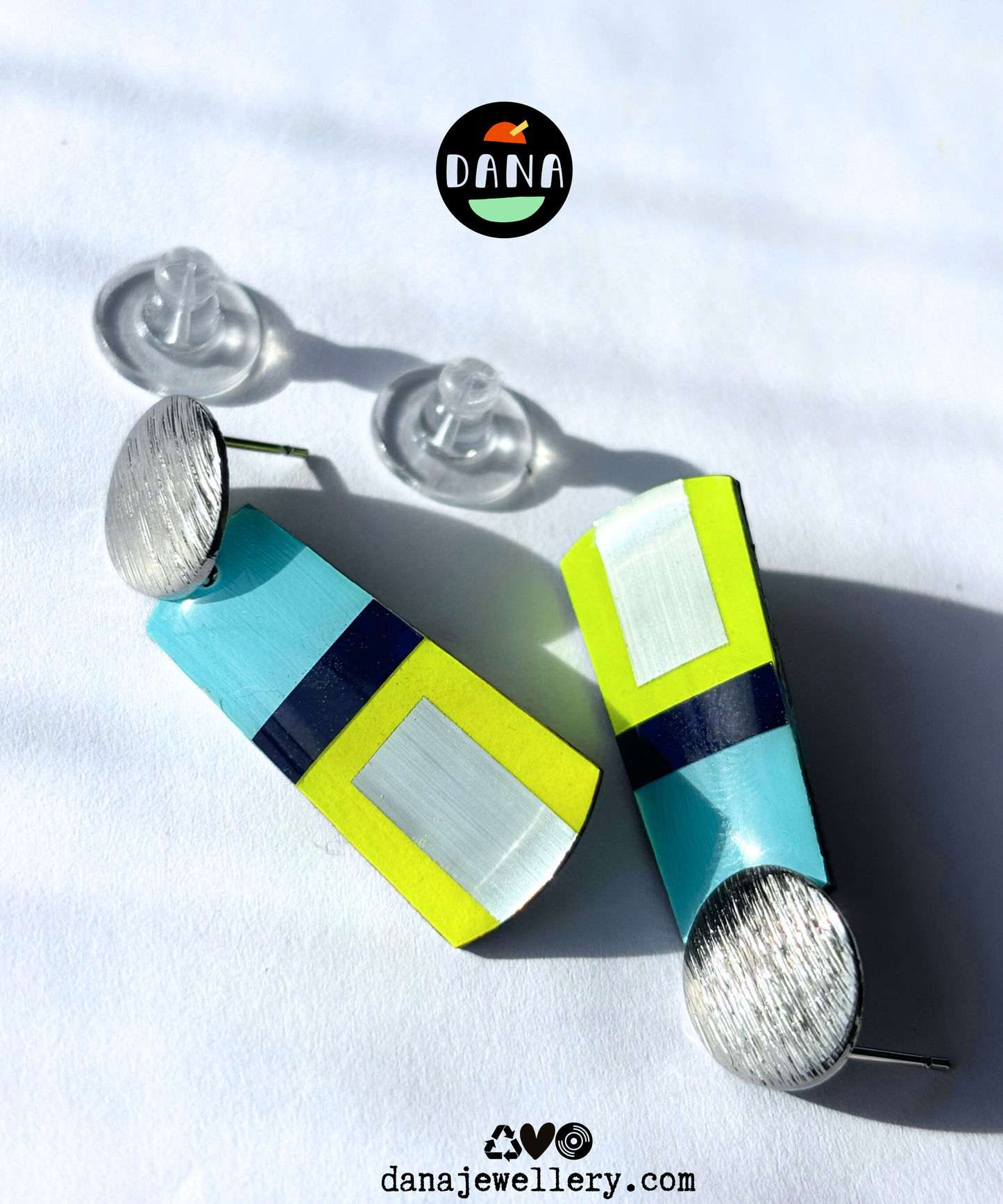 MAE in blue, neon yellow, silver