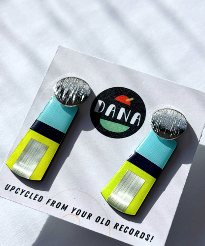 MAE in blue, neon yellow, silver