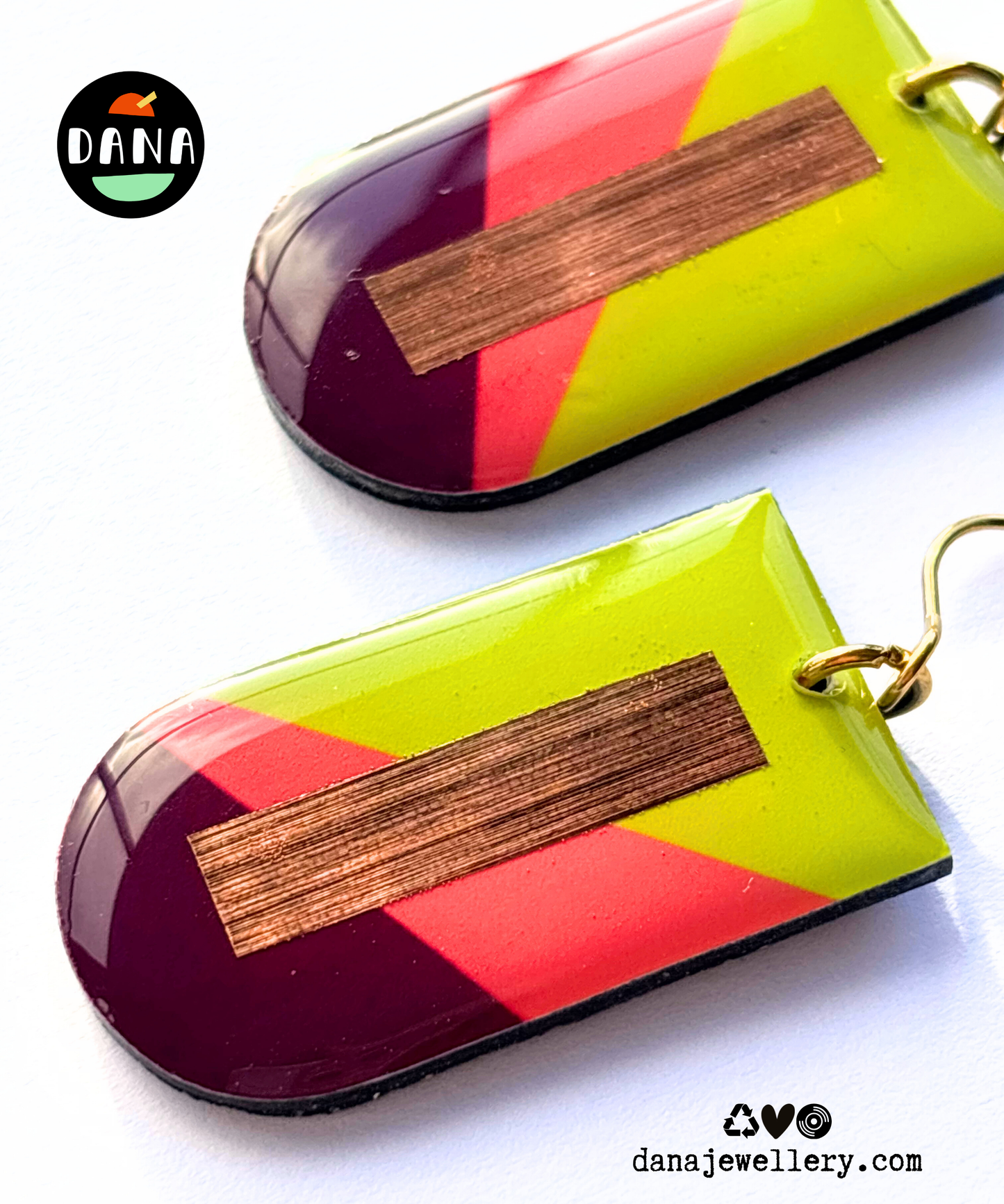 NINA in lime green, deep orange, plum, and copper