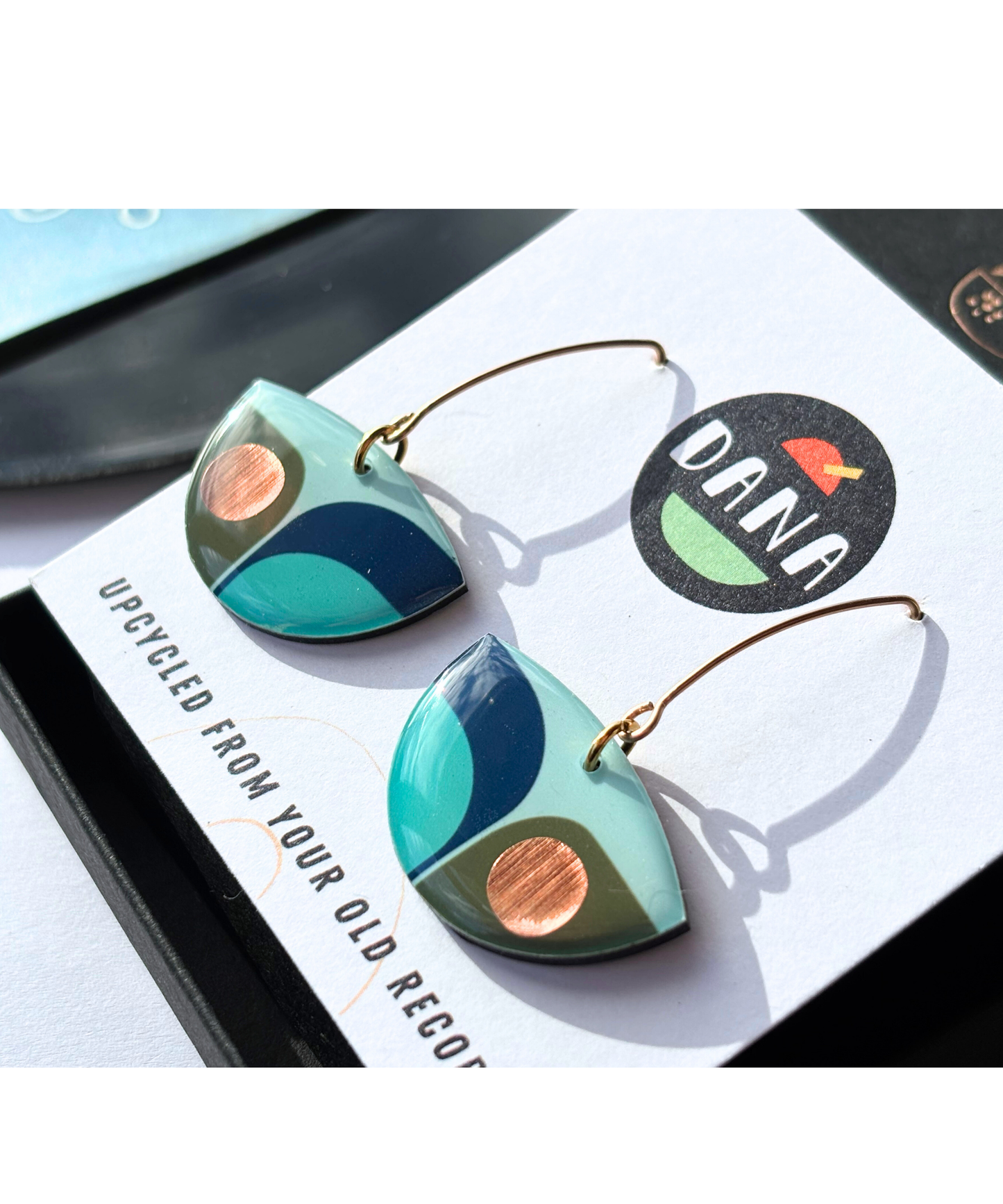 BEA colourful retro inspired recycled vinyl earrings in deep navy blue, olive green and light teal with a warm pop of copper