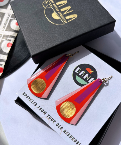 VERA in deep orange, light pink, purple, gold