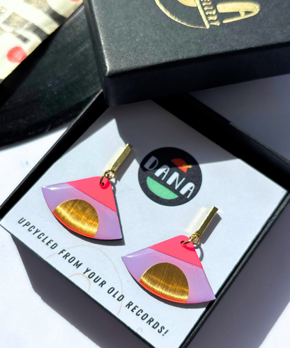 ISLA in lilac, neon pink, and gold