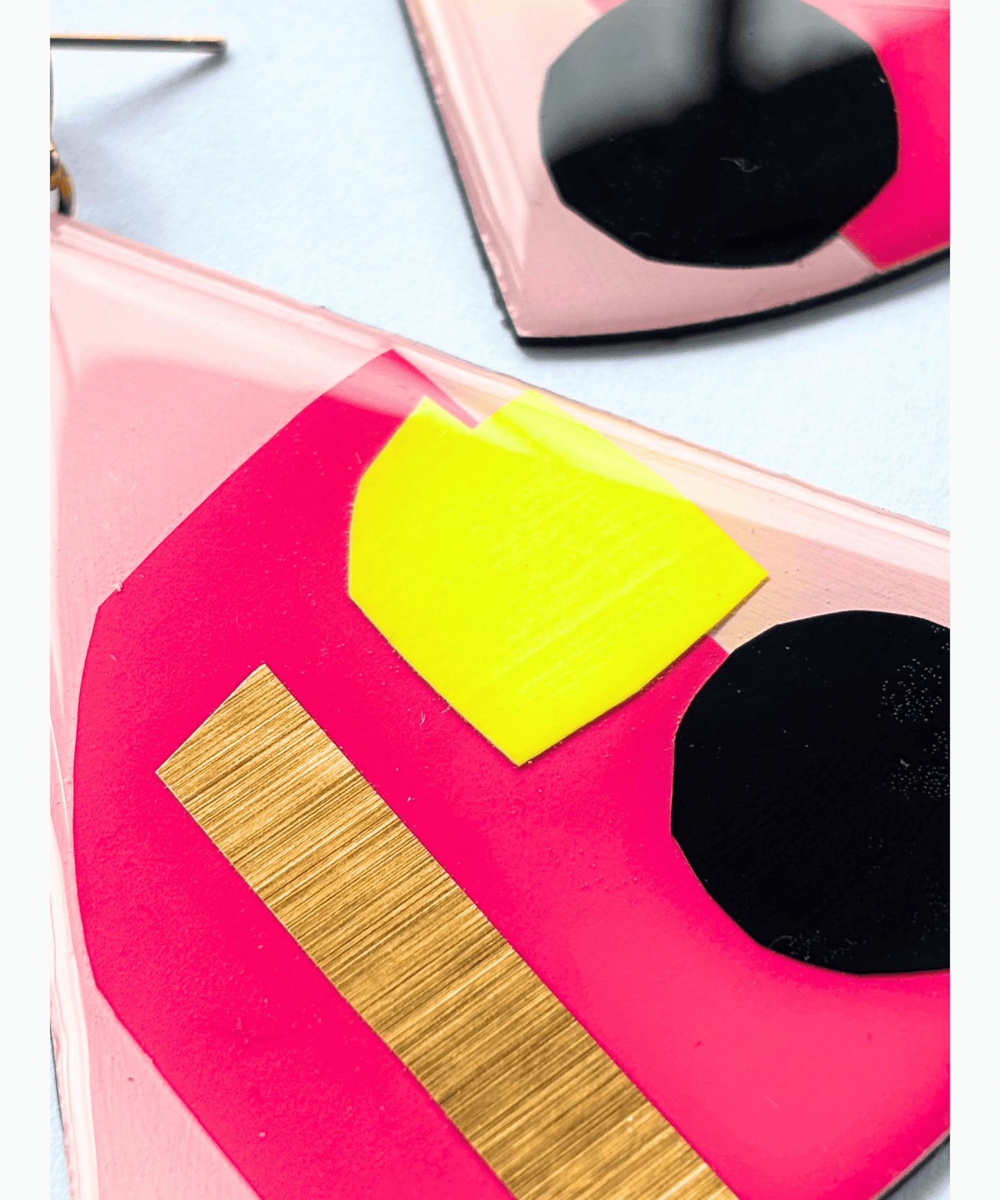 X-large contemporary statement earrings in fuchsia, neon yellow and black, with lush gold detail