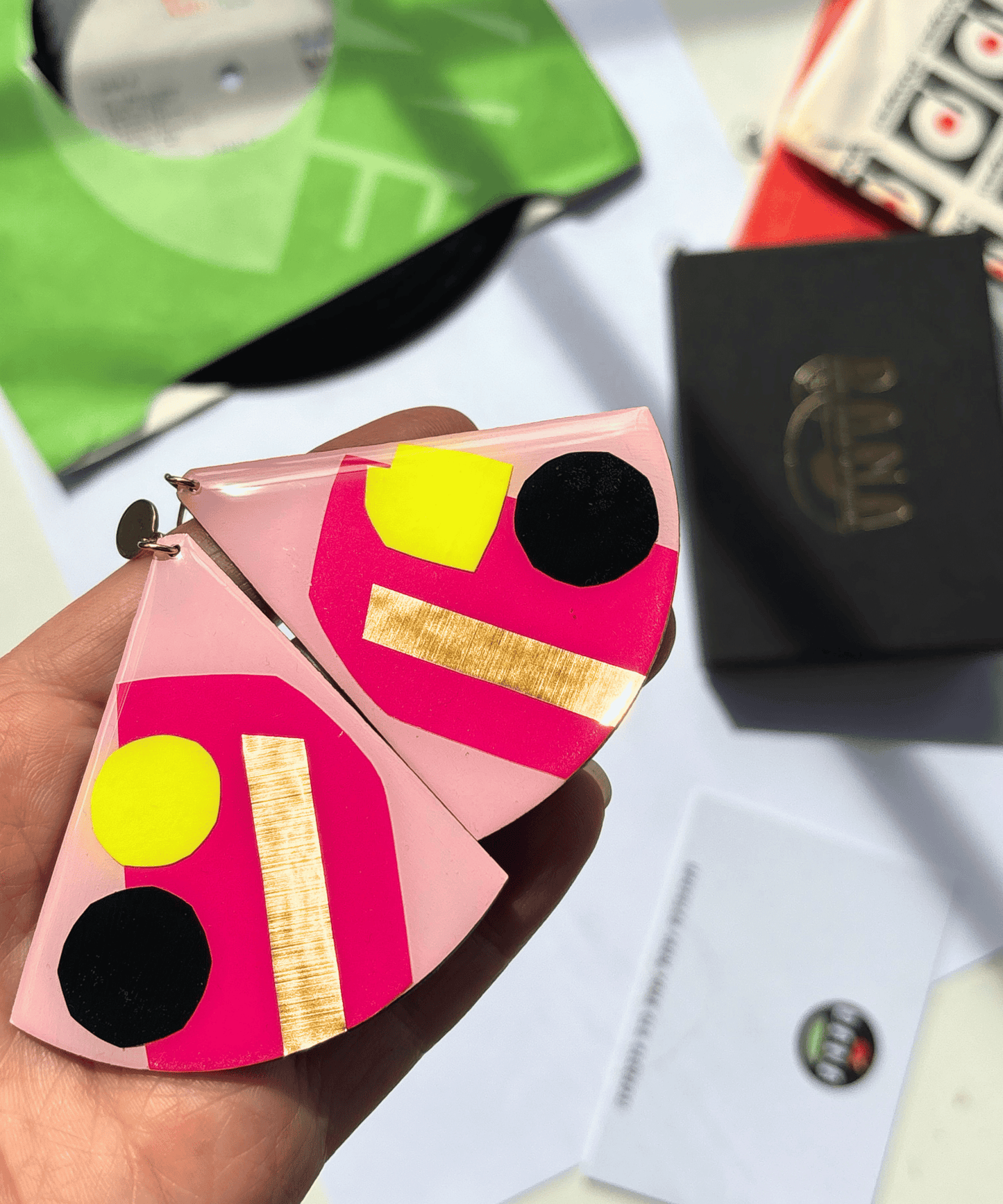 X-large contemporary statement earrings in fuchsia, neon yellow and black, with lush gold detail