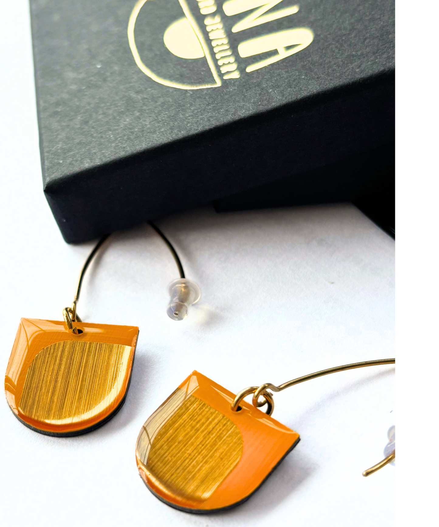 DEE minimalist earrings in yellow and gold handmade in Ireland from recycled vinyl record