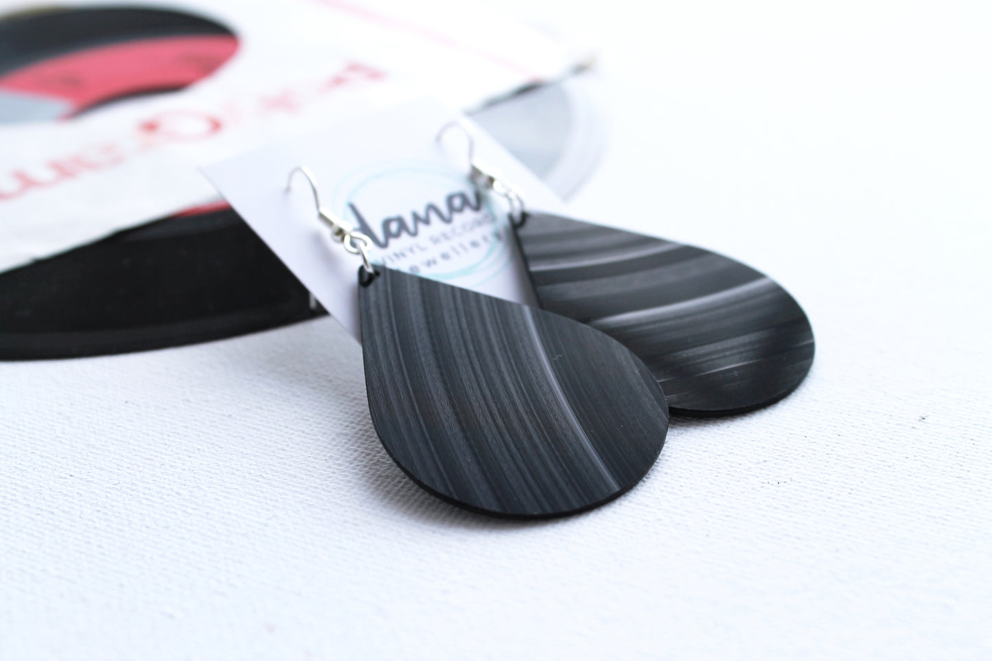 Big bold black teardrop vinyl record earrings by Dana Jewellery