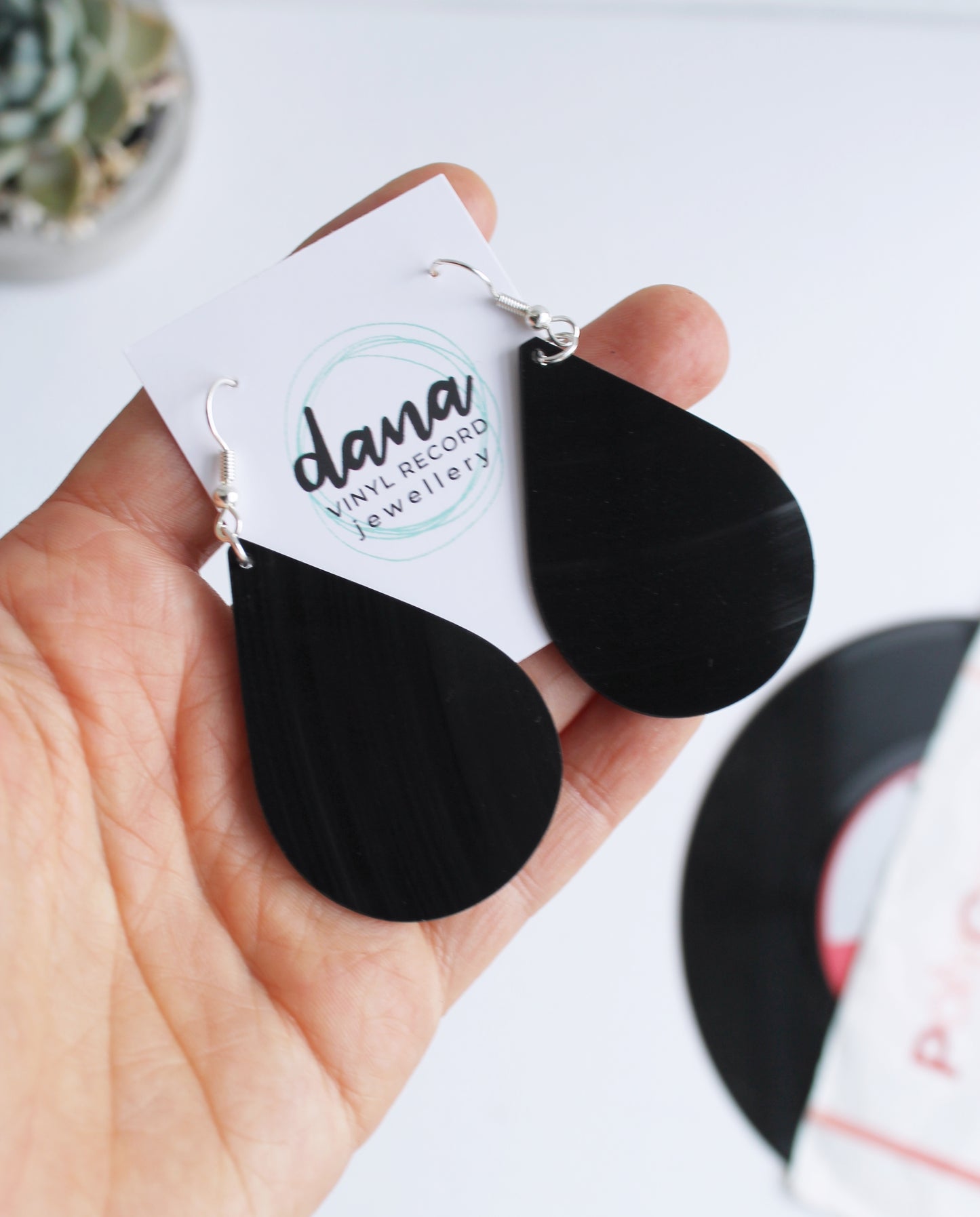 Big bold black teardrop vinyl record earrings by Dana Jewellery