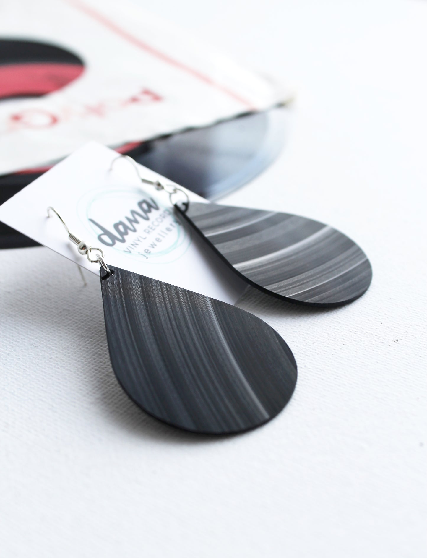 Big bold black teardrop vinyl record earrings by Dana Jewellery